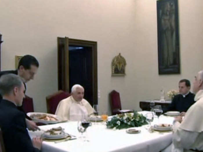 The pope entertains guests in a private dining room, where the food is "simple, but good."