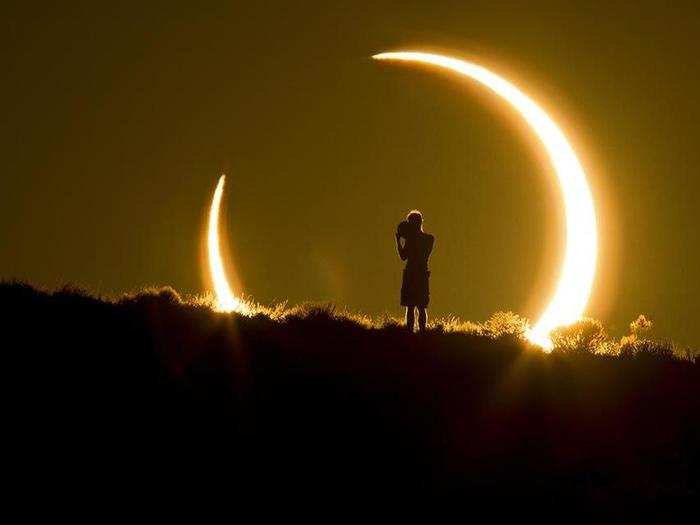 An onlooker watches the annual solar eclipse in Albuquerque, New Mexico.