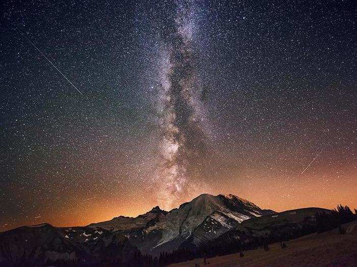 In this gorgeous shot, the Milky Way looks like it is exploding from Mount Rainier in National Park, Washington.