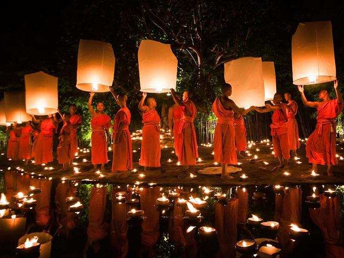 Monks release lanterns for Loy Krathong Buddhist Festival in Chiang Mai, Thailand.