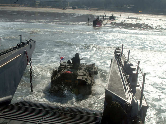 Then the Marine companies jump off the boats for the land assault.