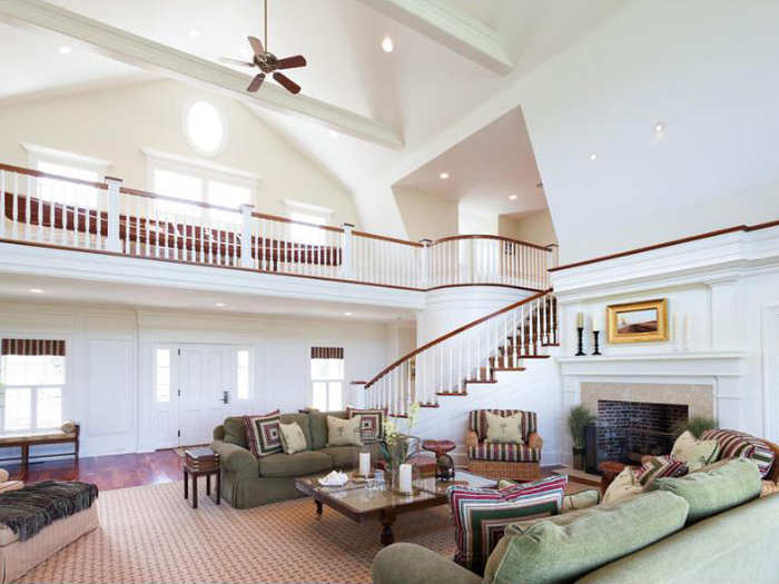 The living room has very high ceilings.