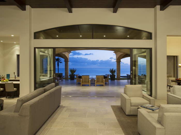 Huge doorways open out towards the ocean and covered courtyard, which is 3,100 square-feet on its own.