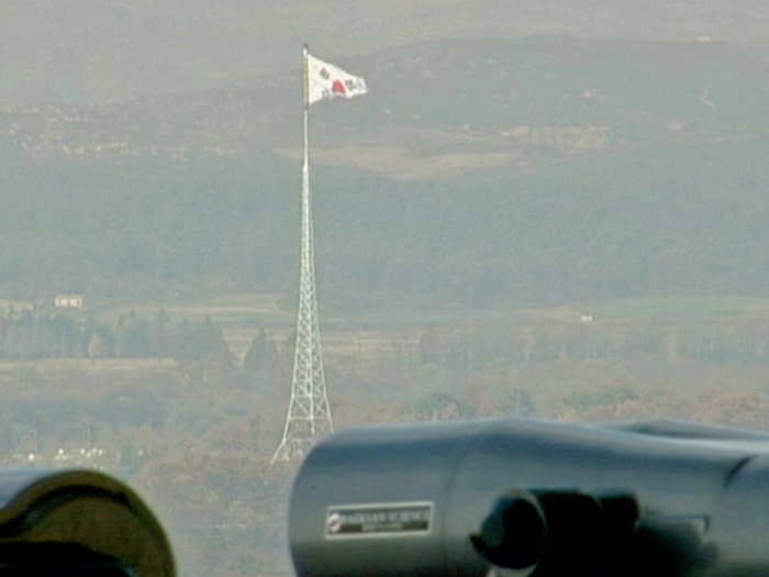 And when the South raised a big 323-foot-tall flag pole with their flag waving ...