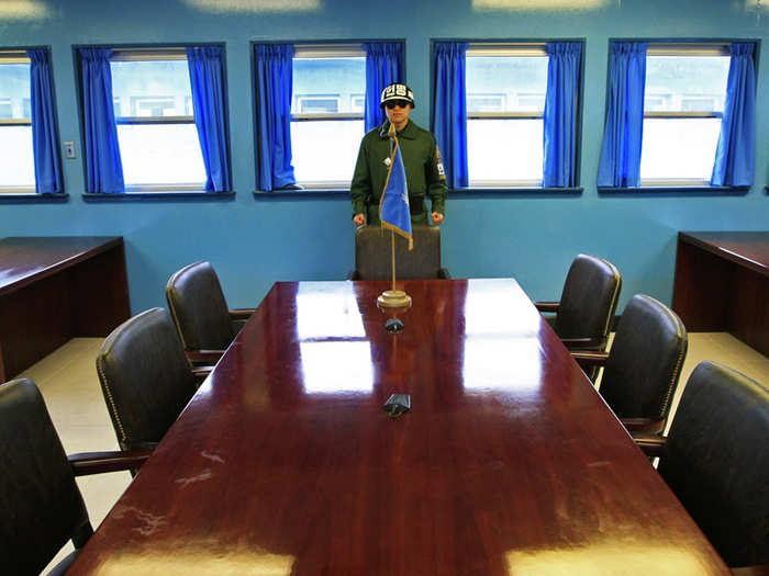 In this small room, a tourist can walk around the conference table and say they