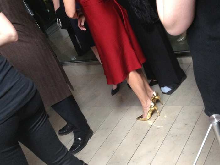 But she chose the right shoes to stand out in the crowd.