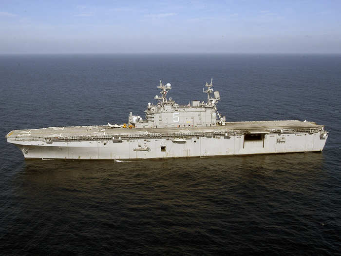 The USS Peleliu (LHA-5) is an amphibious assault ship that brings aircraft and Marines into the fight.