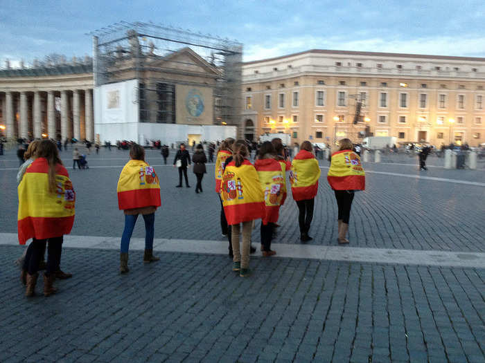 Back inside the square are visitors from around the world. Like this group, which is obviously from Spain.