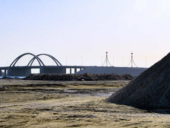 But on the ground, this project looks only like piles of rocks and sand.