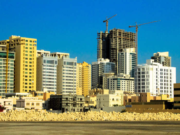 The new land is overlooked by this impatient skyline.