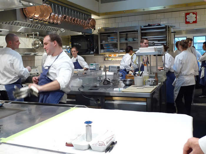 The diners entered the expertly-run kitchen where all the chefs were making sure each dish was ready to go.