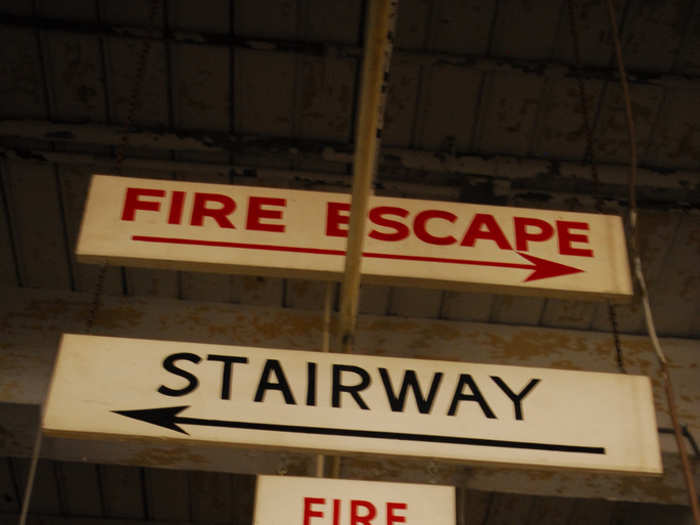 These fire escape signs look vintage.