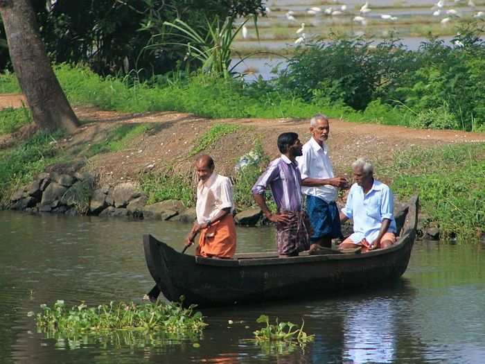 The Kerala houseboats float no faster than 10-15 mph, so they were able to take amazing pictures of the scenery and people they saw.