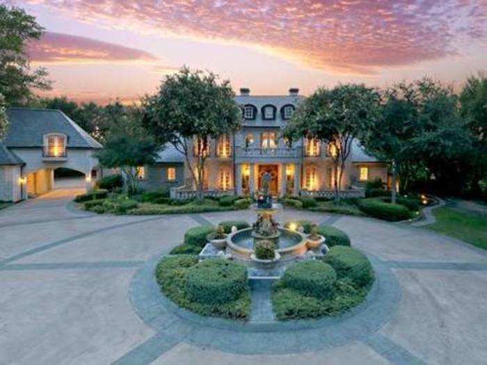 This lakefront home in Texas home comes with 200-year=old French antique doors.