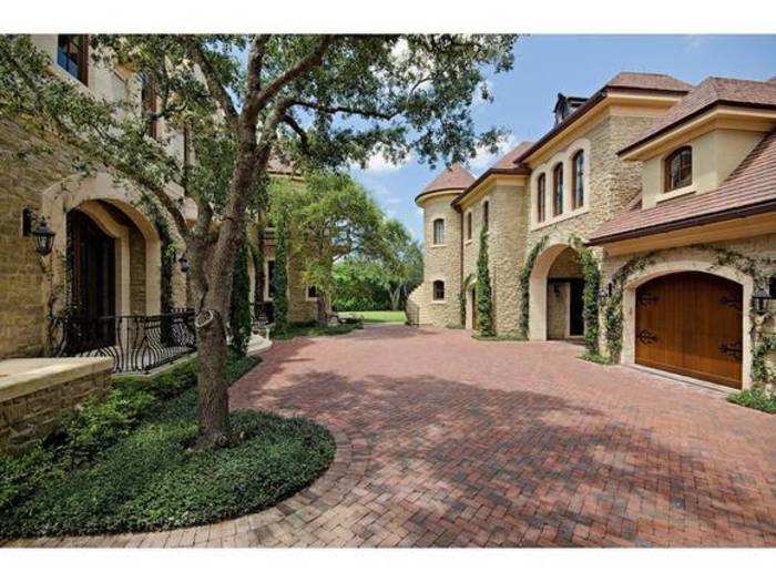 This home is detailed with imported French antique light fixtures.