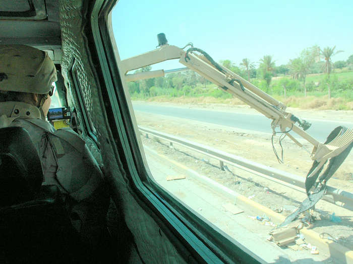 With troops sitting safely inside an air-conditioned cabin, they can pick up a suspicious object — with upward of 16 feet of clearance.