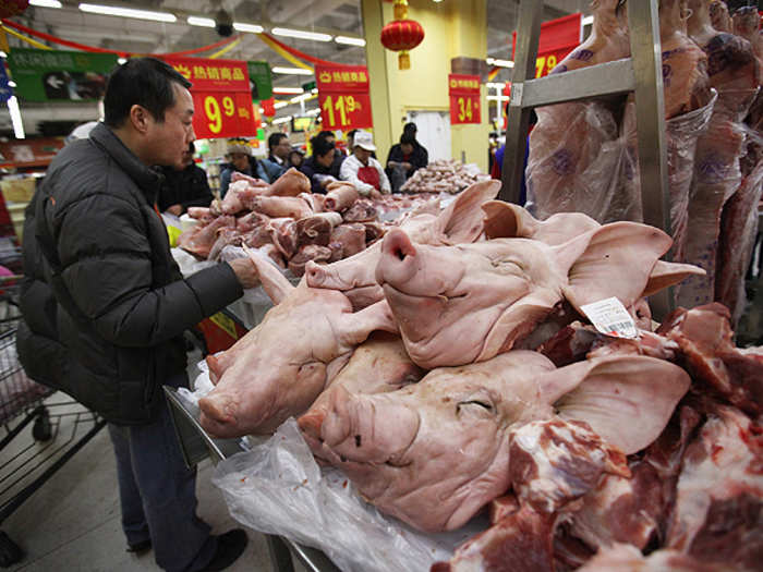 China produces nearly six times as much pork per person as the rest of the world.