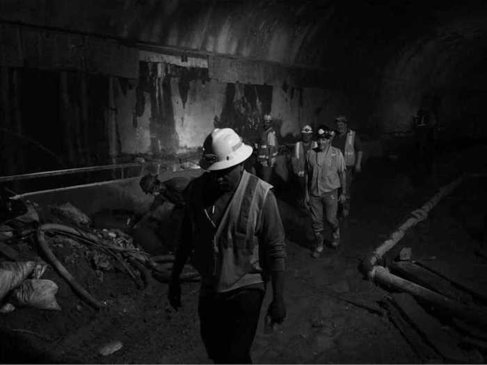 Troops of construction workers arrive each day to work on the project. The MTA has pushed its completion to a later date several times.