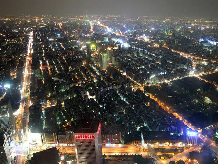 Taipei 101 in Taipei, Taiwan, rises 1,671 feet above the city.