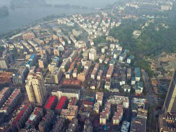 Zifeng Tower in Nanjing, China, reaches 1,476 ft. Also called the Nanjing Greenland Financial Center, the building houses office spaces, stores, restaurants, a hotel, and a public observatory on the 72nd floor.