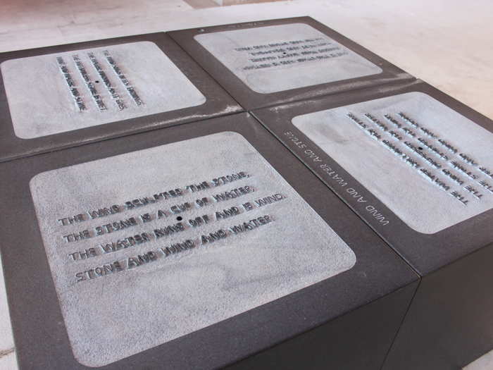 In the middle of the resort, poems are carved into this stone.