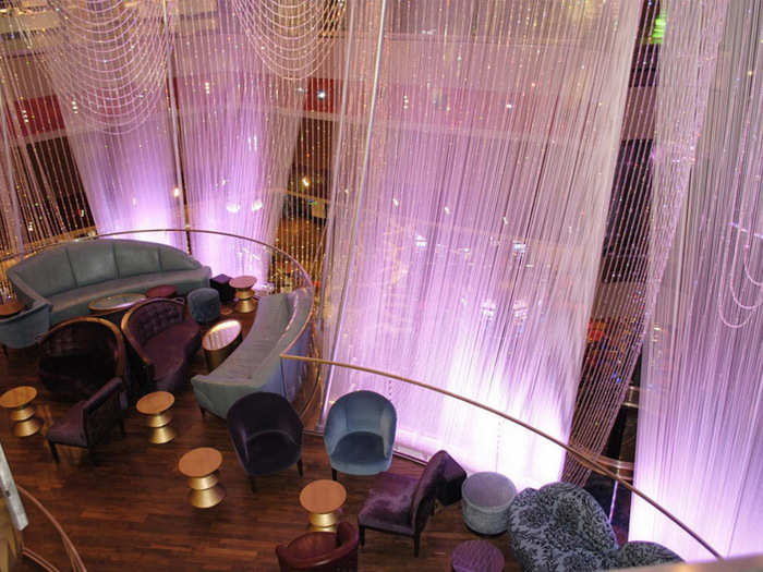 The second floor, which is enshrouded by the massive crystal chandelier, is a cocktail lounge.