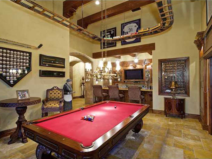 This man cave in Rancho Santa Fe, Calif. puts many other man caves to shame. With these high, cathedral-like ceilings, you and your buddies can toss your own pig skin around.