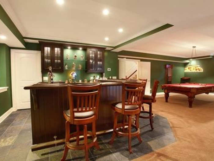 This home in Naperville, Ill. appeals to the sports fan. The lower level is designed with a built-in bar, pool table, gaming and gathering areas for watching football.