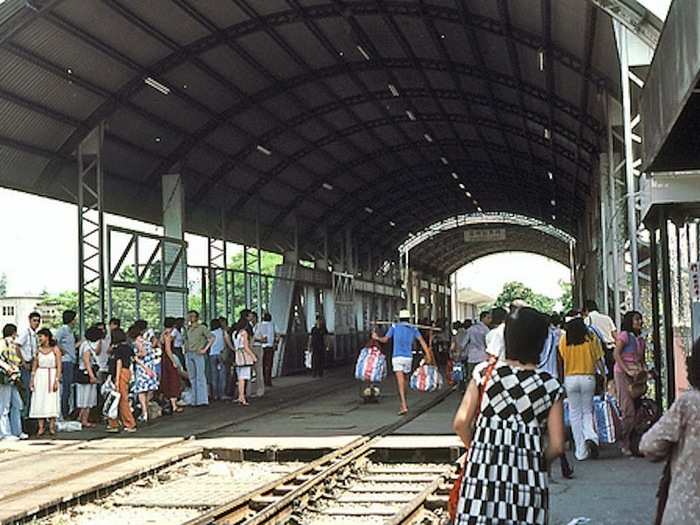 The gap in the roof structure (and the sign, which reads "Station Limit") is located at the HK / China frontier. The old bridge has been replaced, but preserved as a monument. From my notes: 