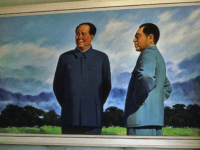 Painting of Mao Zedong and Zhou Enlai. Closer view of the painting visible in the previous photo. I note that Zhou has his back to the sun, and appears to be standing 