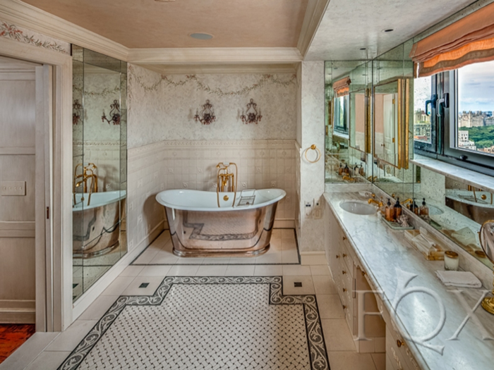 It also has a gorgeous marble master bath with soaking tub, shower stall, water closet (with bidet), and double vanity.