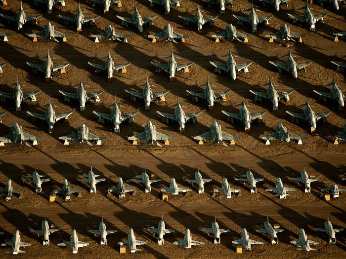 Rows of F-4 Phantoms and T-38 Talons line the grounds.