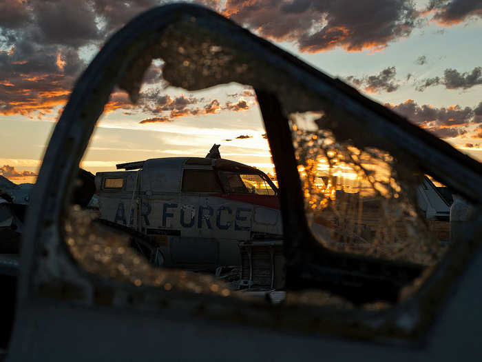 The remains of a B-66 Destroyer seen through the shattered cockpit glass of an F-86 Sabre.