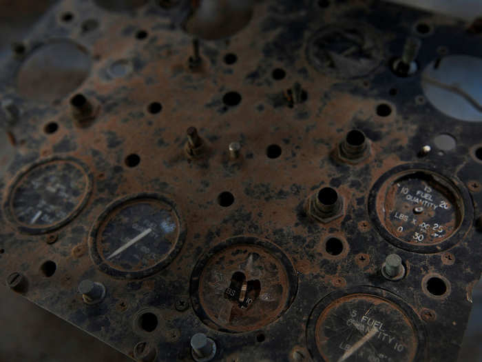 Cracked and rusted gauges from an old blimp show the signs of sitting unused for decades.