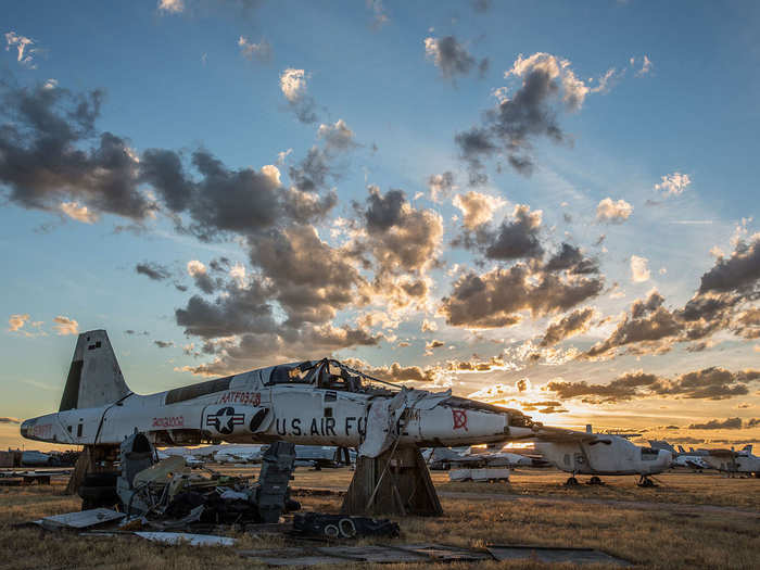 A retired, rusted, faded T-38 Talon sits in pieces. The Talon was the world