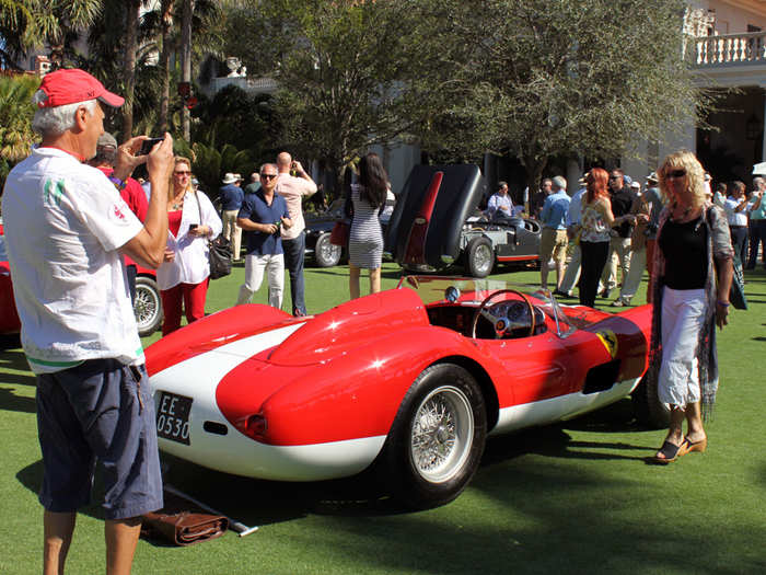 Lots of spectators posed for photos with the Ferraris.