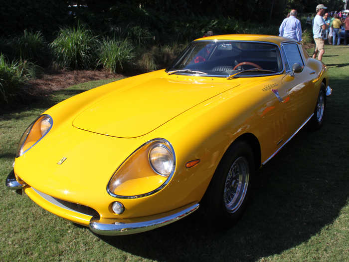 This bright yellow Ferrari was once raced by Ecurie Francorchamps,  a Belgian motor racing team.