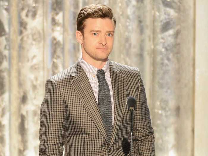 Justin Timberlake stepped out in a not-so-fabulous suit & tie to present.