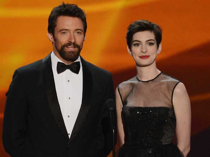 Anne Hathaway and Hugh Jackman described "Les Misérables" as the film where the "Gladiator" chases around Wolverine and Catwoman gives birth to baby she leaves in the care of Harry Potter