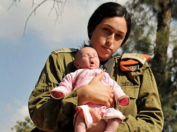 She was six months pregnant. Then three months after graduation, she gave birth to a healthy child ... and future IDF hard charger no doubt.