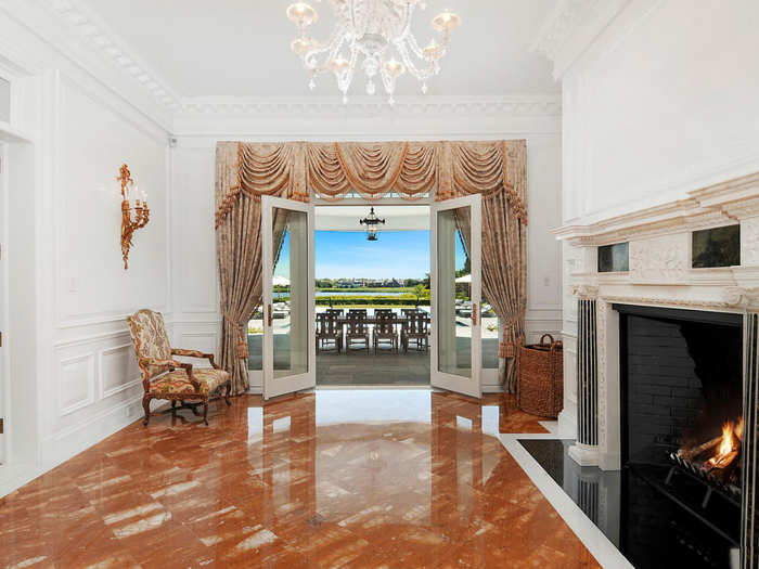 Two bay doors open out to the stunning backyard view.