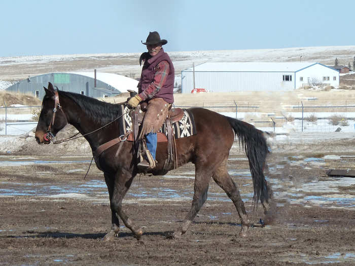 At ski-joring, real-live cowboys and cowgirls pull the skiers around the track.