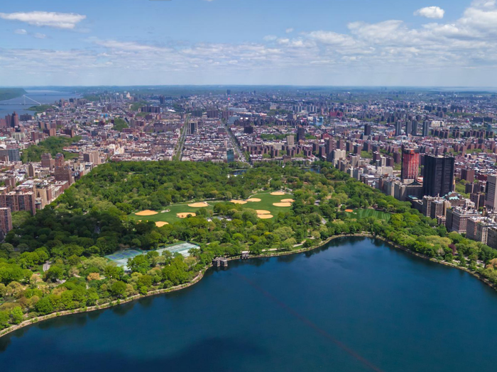 Looking uptown from the pristine Jackie Onassis Reservoir at Central Park.