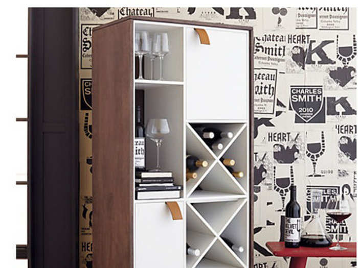 This bookshelf and wine-rack combo for $899 saves space and has hidden compartments for extra storage.