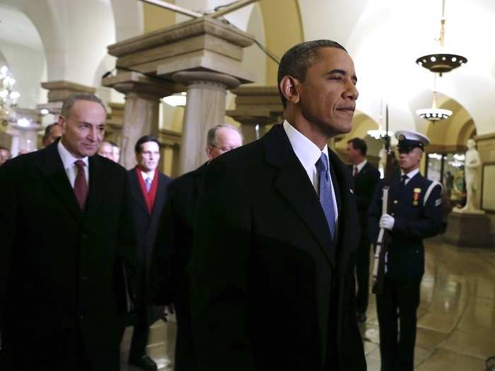 Obama prepares to step on to the platform for his ceremonial swearing-in.