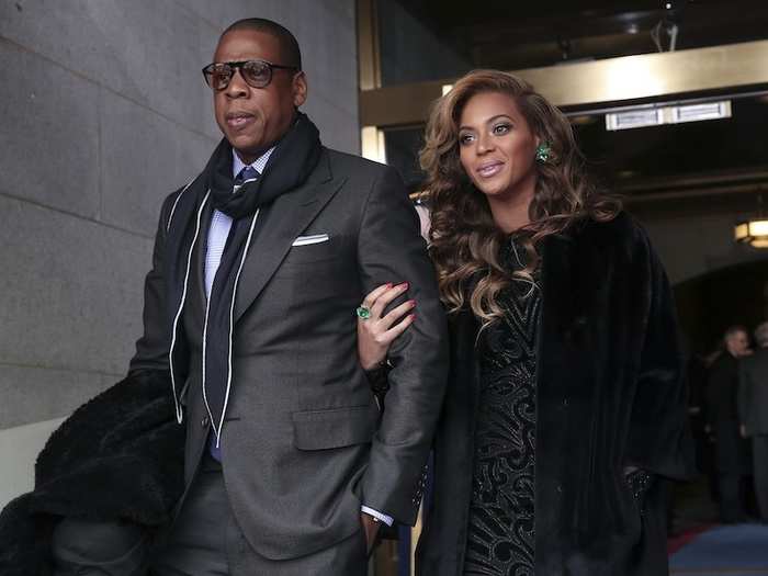 Beyonce and Jay-Z make a stunning entrance on to the platform.