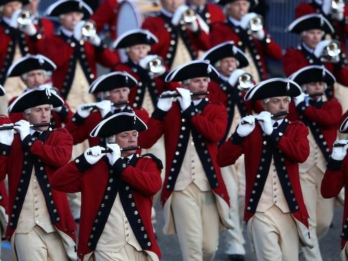 The parade kicks off with a ceremonial military band.