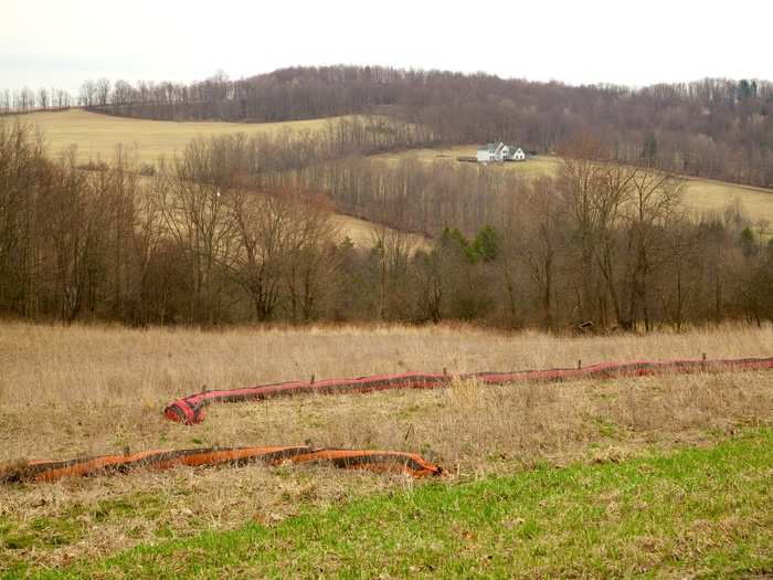 These mulch-filled socks are used to catch water runoff and control erosion.