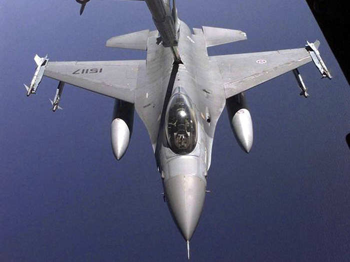 The F-16 can go the distance, with a range of over 2,000 miles (1,740 nautical miles) that can be extended through in-flight refueling like you see here.