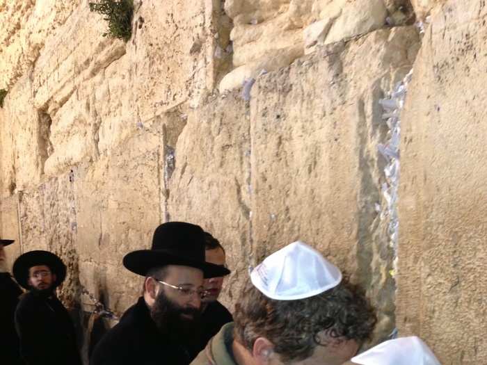 Paul and his youngest son Robert, 13, take a moment at the Wall.